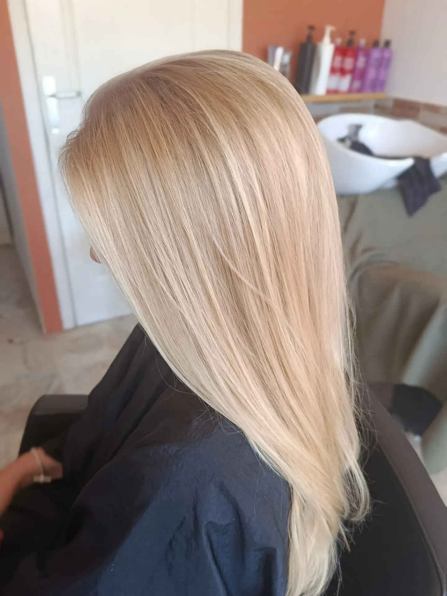 Bright icy blonde on long straight hair