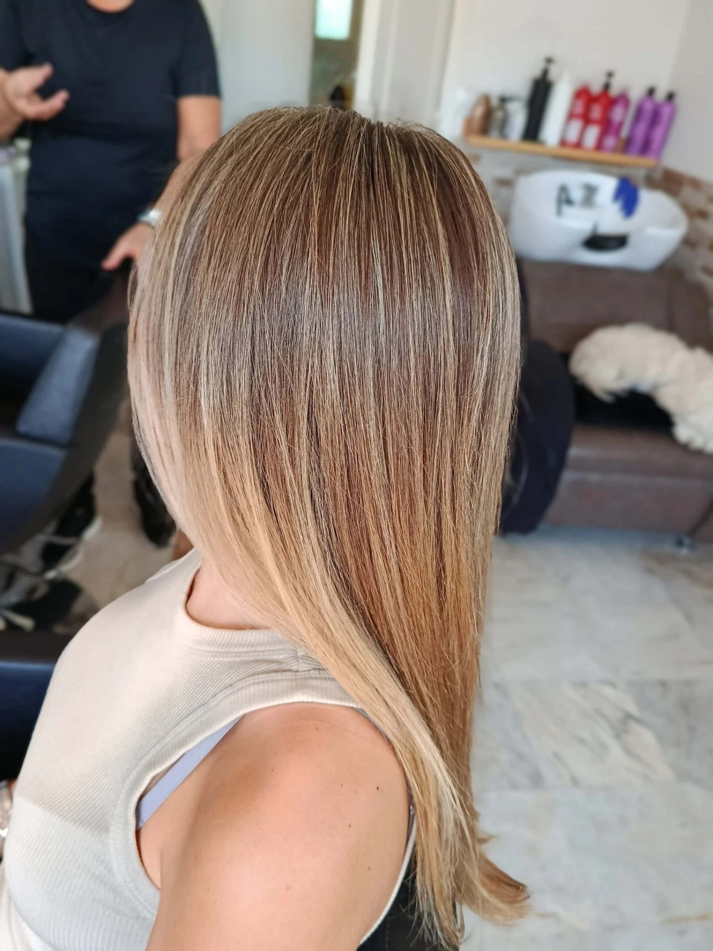 Sun-kissed balayage with natural dimension on mid-length hair