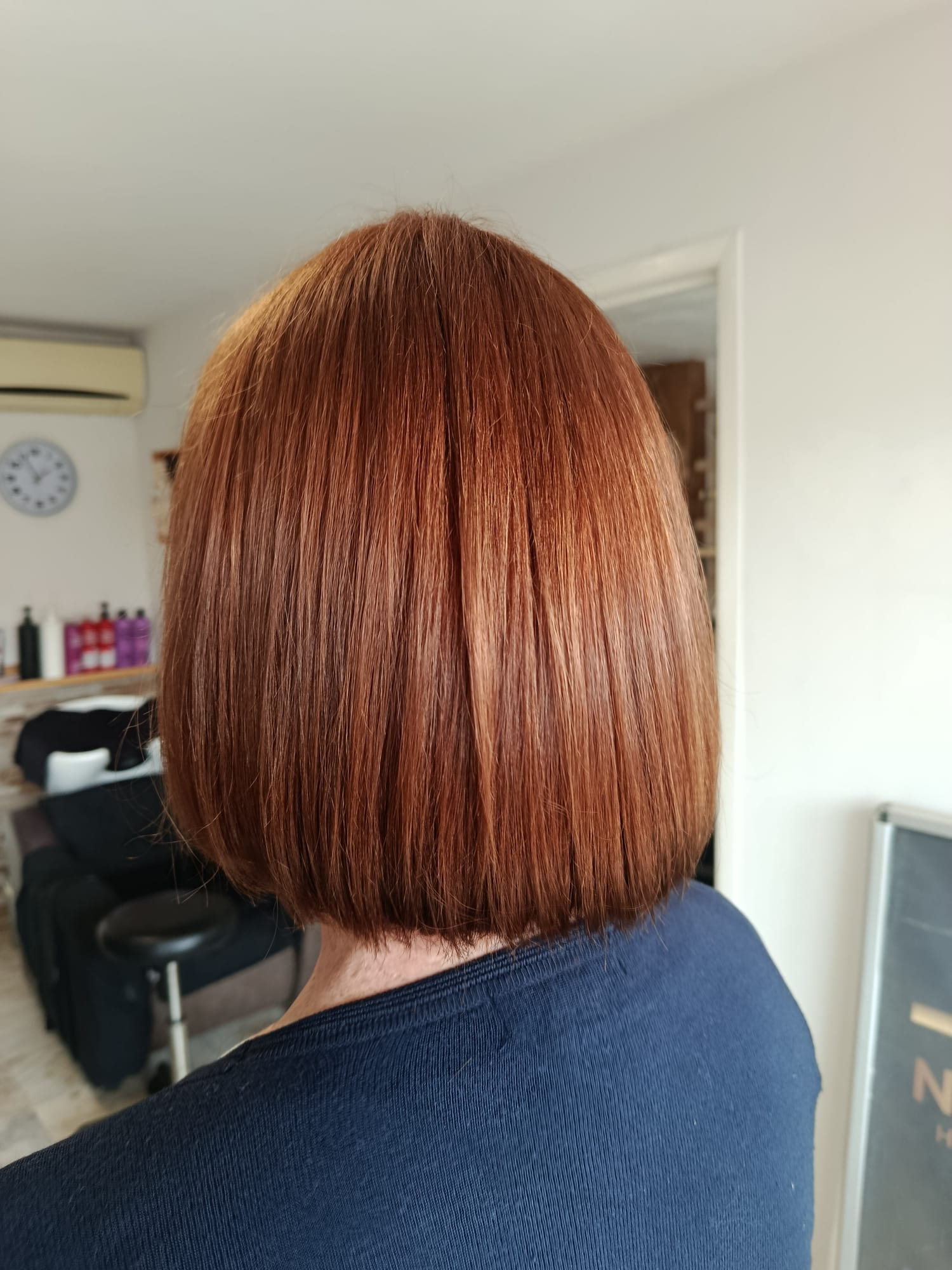Shiny copper red bob with an all-over colour