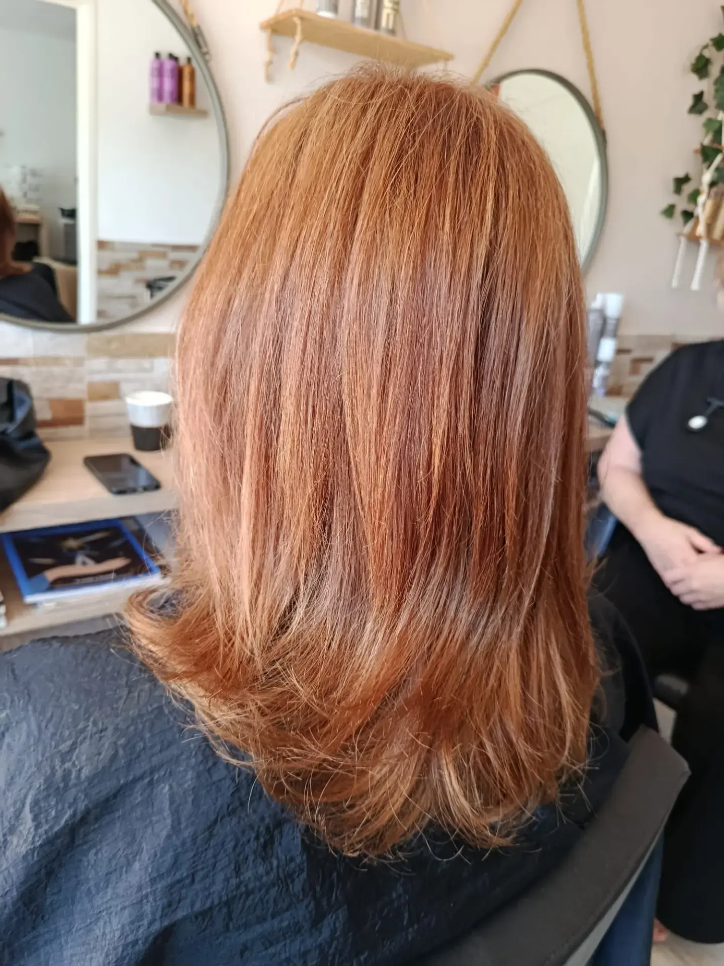 Client having her hair finished at Katie Snowden Hair near La Cala de Mijas